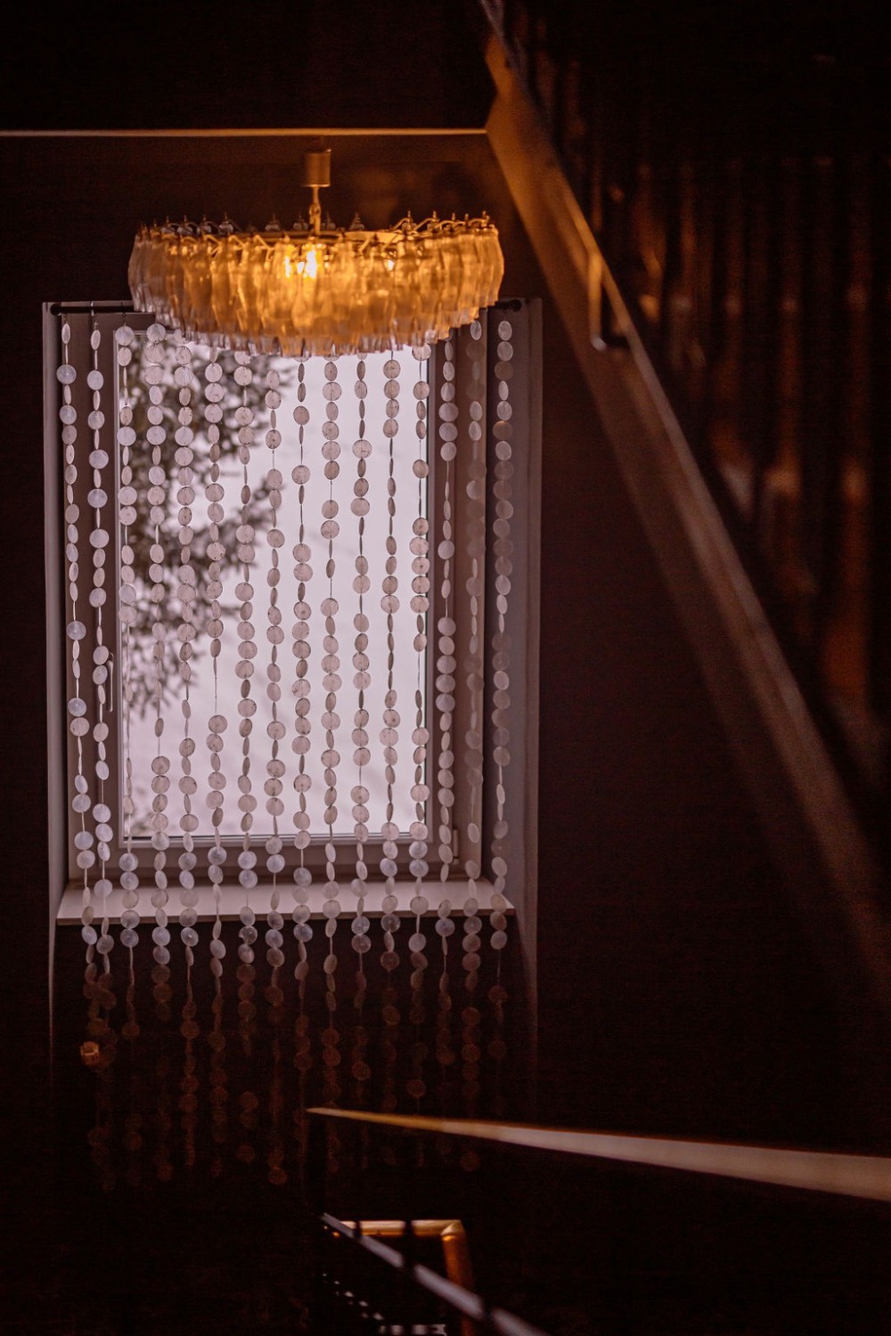 Hotel Miramonte Vorhang in Zimmer mit Kristall Leuchter